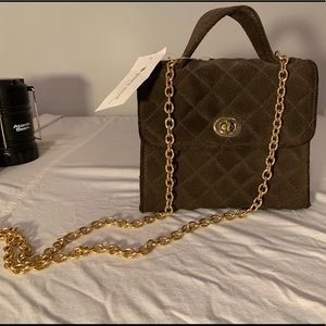 Brown purse with gold chain